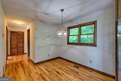 This beautiful completely remolded Home in Sky Valley offers one on Sky Valley Resort and Country Club in Georgia - for sale on GolfHomes.com, golf home, golf lot