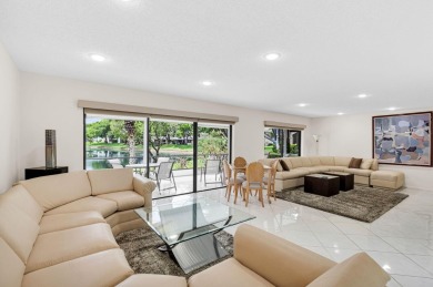 Enjoy serene water views from this light and bright first-floor on Hunters Run Golf and Country Club in Florida - for sale on GolfHomes.com, golf home, golf lot