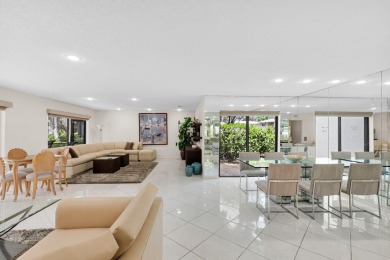 Enjoy serene water views from this light and bright first-floor on Hunters Run Golf and Country Club in Florida - for sale on GolfHomes.com, golf home, golf lot