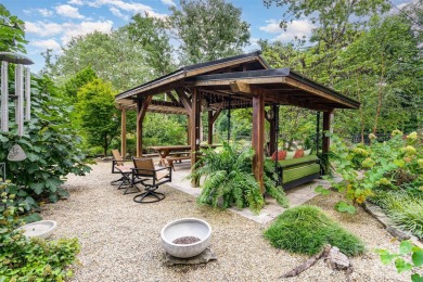 This storybook home offers character, charm, and a backyard on Rock Hill Country Club in South Carolina - for sale on GolfHomes.com, golf home, golf lot