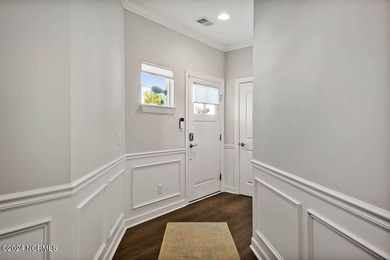 A beautiful and well-maintained home. The Owen, built by True on Cape Fear National At Brunswick Forest in North Carolina - for sale on GolfHomes.com, golf home, golf lot