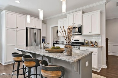 A beautiful and well-maintained home. The Owen, built by True on Cape Fear National At Brunswick Forest in North Carolina - for sale on GolfHomes.com, golf home, golf lot