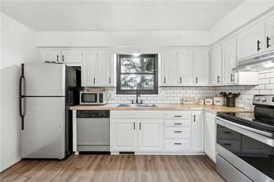 Updated golf-course duplex with strong income potential and on Holiday Island Golf Course in Arkansas - for sale on GolfHomes.com, golf home, golf lot