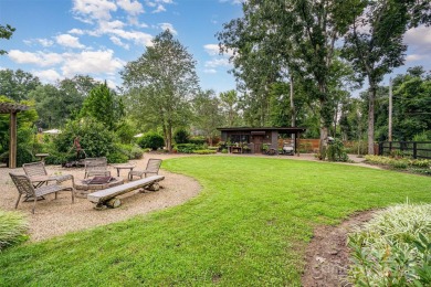 This storybook home offers character, charm, and a backyard on Rock Hill Country Club in South Carolina - for sale on GolfHomes.com, golf home, golf lot