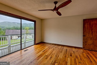 This beautiful completely remolded Home in Sky Valley offers one on Sky Valley Resort and Country Club in Georgia - for sale on GolfHomes.com, golf home, golf lot