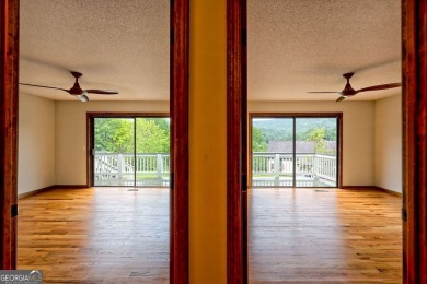 This beautiful completely remolded Home in Sky Valley offers one on Sky Valley Resort and Country Club in Georgia - for sale on GolfHomes.com, golf home, golf lot