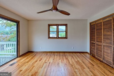 This beautiful completely remolded Home in Sky Valley offers one on Sky Valley Resort and Country Club in Georgia - for sale on GolfHomes.com, golf home, golf lot