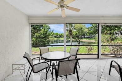 Enjoy serene water views from this light and bright first-floor on Hunters Run Golf and Country Club in Florida - for sale on GolfHomes.com, golf home, golf lot
