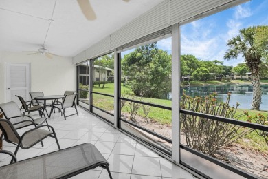 Enjoy serene water views from this light and bright first-floor on Hunters Run Golf and Country Club in Florida - for sale on GolfHomes.com, golf home, golf lot