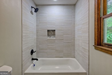 This beautiful completely remolded Home in Sky Valley offers one on Sky Valley Resort and Country Club in Georgia - for sale on GolfHomes.com, golf home, golf lot
