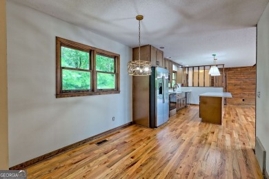 This beautiful completely remolded Home in Sky Valley offers one on Sky Valley Resort and Country Club in Georgia - for sale on GolfHomes.com, golf home, golf lot