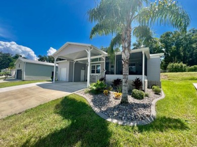 Home is located in Water Oak Country Club Estates in Lady Lake on Water Oak Country Club Estates in Florida - for sale on GolfHomes.com, golf home, golf lot