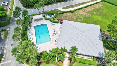 Enjoy serene water views from this light and bright first-floor on Hunters Run Golf and Country Club in Florida - for sale on GolfHomes.com, golf home, golf lot
