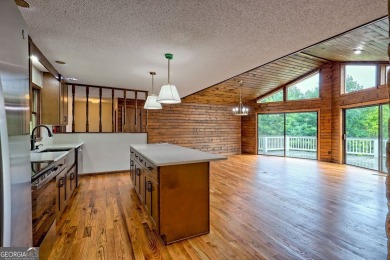 This beautiful completely remolded Home in Sky Valley offers one on Sky Valley Resort and Country Club in Georgia - for sale on GolfHomes.com, golf home, golf lot