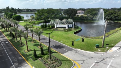 Enjoy serene water views from this light and bright first-floor on Hunters Run Golf and Country Club in Florida - for sale on GolfHomes.com, golf home, golf lot