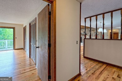 This beautiful completely remolded Home in Sky Valley offers one on Sky Valley Resort and Country Club in Georgia - for sale on GolfHomes.com, golf home, golf lot