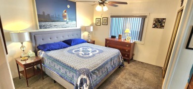 This spacious 2-bedroom, 2- bath residence is situated on a on Palm Desert Greens Country Club in California - for sale on GolfHomes.com, golf home, golf lot