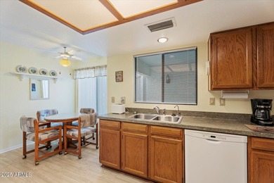 Step into this fully furnished, move-in-ready 2-BD END-UNIT on Fountain of the Sun Country Club in Arizona - for sale on GolfHomes.com, golf home, golf lot