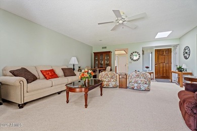 Step into this fully furnished, move-in-ready 2-BD END-UNIT on Fountain of the Sun Country Club in Arizona - for sale on GolfHomes.com, golf home, golf lot