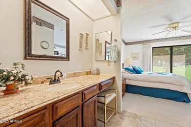 Step into this fully furnished, move-in-ready 2-BD END-UNIT on Fountain of the Sun Country Club in Arizona - for sale on GolfHomes.com, golf home, golf lot