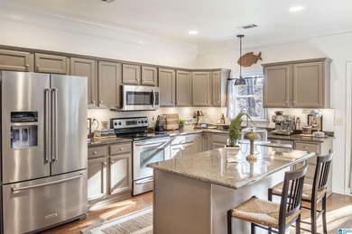 INVERNESS COVE AWAITS YOU!  THIS AMAZING 3 BEDROOM/2.5 BATH on Inverness Country Club in Alabama - for sale on GolfHomes.com, golf home, golf lot