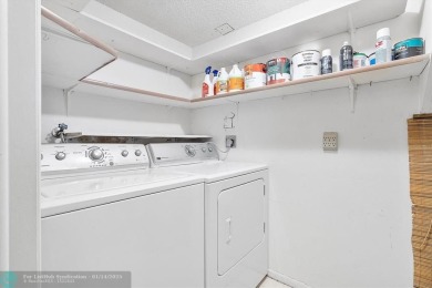 This spacious 3-bedroom, 2.5-bathroom corner unit townhome is on Pine Island Ridge Country Club in Florida - for sale on GolfHomes.com, golf home, golf lot