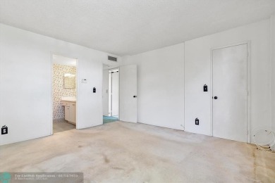 This spacious 3-bedroom, 2.5-bathroom corner unit townhome is on Pine Island Ridge Country Club in Florida - for sale on GolfHomes.com, golf home, golf lot