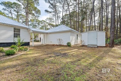 You'll fall in love with this Creole cottage-style home nestled on Isle Dauphine Club Golf Course in Alabama - for sale on GolfHomes.com, golf home, golf lot