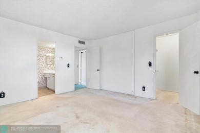 This spacious 3-bedroom, 2.5-bathroom corner unit townhome is on Pine Island Ridge Country Club in Florida - for sale on GolfHomes.com, golf home, golf lot