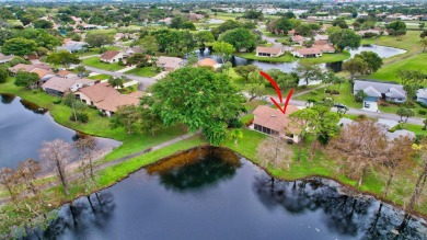 Magnificent lake view 2 bedroom, 2 bathroom, 2 car garage home on Boca Delray Golf and Country Club in Florida - for sale on GolfHomes.com, golf home, golf lot