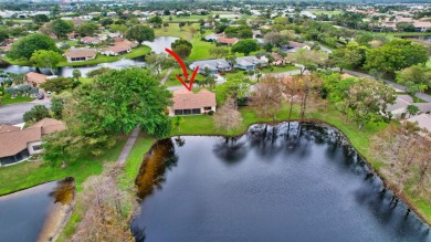 Magnificent lake view 2 bedroom, 2 bathroom, 2 car garage home on Boca Delray Golf and Country Club in Florida - for sale on GolfHomes.com, golf home, golf lot