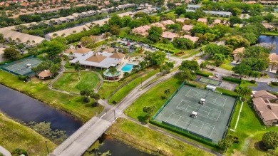 Magnificent lake view 2 bedroom, 2 bathroom, 2 car garage home on Boca Delray Golf and Country Club in Florida - for sale on GolfHomes.com, golf home, golf lot