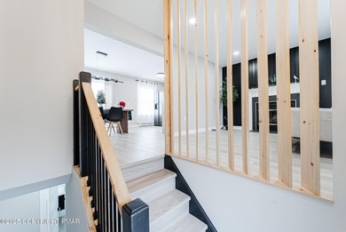 MODERN MINIMALISTIC POCONOS LAKE HOME Completely Renovated 3/4BR on Pocono Farms Country Club in Pennsylvania - for sale on GolfHomes.com, golf home, golf lot