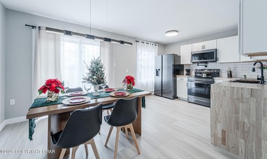 MODERN MINIMALISTIC POCONOS LAKE HOME Completely Renovated 3/4BR on Pocono Farms Country Club in Pennsylvania - for sale on GolfHomes.com, golf home, golf lot