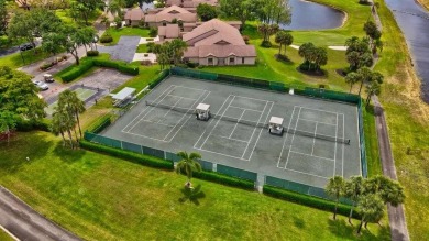 Magnificent lake view 2 bedroom, 2 bathroom, 2 car garage home on Boca Delray Golf and Country Club in Florida - for sale on GolfHomes.com, golf home, golf lot