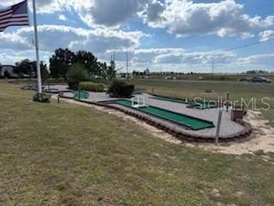 Check out this cute as can be MH Home where you OWN your lot! on Southern Dunes Golf and Country Club in Florida - for sale on GolfHomes.com, golf home, golf lot