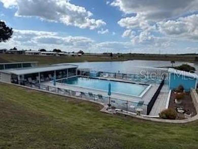 Check out this cute as can be MH Home where you OWN your lot! on Southern Dunes Golf and Country Club in Florida - for sale on GolfHomes.com, golf home, golf lot