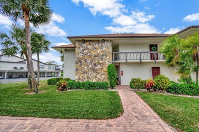 This beautifullyrenovated first-floor condo is nestled within on Seagate Country Club in Florida - for sale on GolfHomes.com, golf home, golf lot