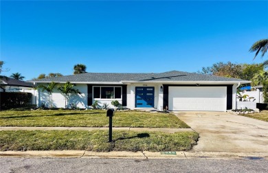 Offered for sale, newly renovated and completely updated 4/4 on Rocky Point Golf Course in Florida - for sale on GolfHomes.com, golf home, golf lot