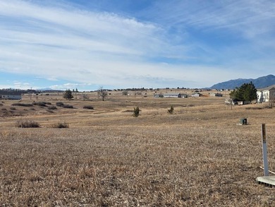 Vacant building lot on paved Cuerno Verde with water and sewer on Hollydot Golf Course in Colorado - for sale on GolfHomes.com, golf home, golf lot