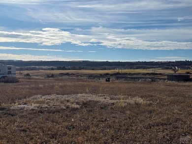 Vacant building lot on paved Cuerno Verde with water and sewer on Hollydot Golf Course in Colorado - for sale on GolfHomes.com, golf home, golf lot
