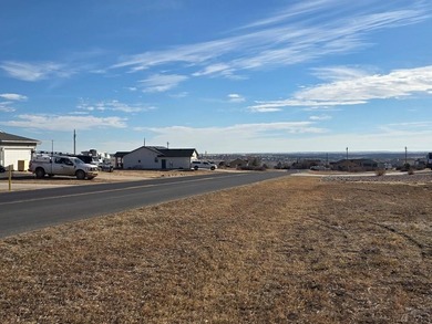 Vacant building lot on paved Cuerno Verde with water and sewer on Hollydot Golf Course in Colorado - for sale on GolfHomes.com, golf home, golf lot