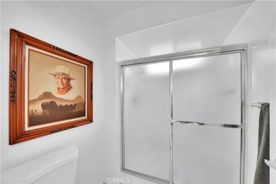 Set on a premium corner lot along the 8th fairway, this Casa on Leisure Village Par 3 Golf Course in California - for sale on GolfHomes.com, golf home, golf lot