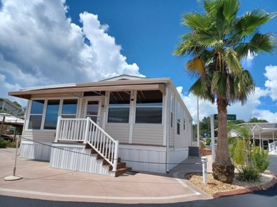 PRICE REDUCTION!!!  Whether searching for a full-time retirement on Deer Creek RV Golf Resort in Florida - for sale on GolfHomes.com, golf home, golf lot