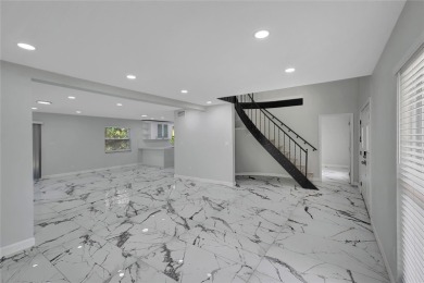 Discover this beautifully renovated 4-bedroom, 3-bath,  dream on Temple Terrace Golf and Country Club in Florida - for sale on GolfHomes.com, golf home, golf lot