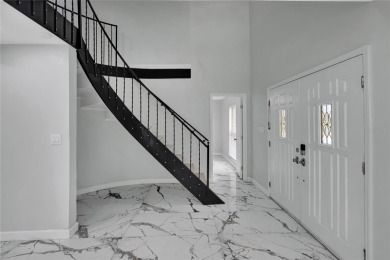 Discover this beautifully renovated 4-bedroom, 3-bath,  dream on Temple Terrace Golf and Country Club in Florida - for sale on GolfHomes.com, golf home, golf lot