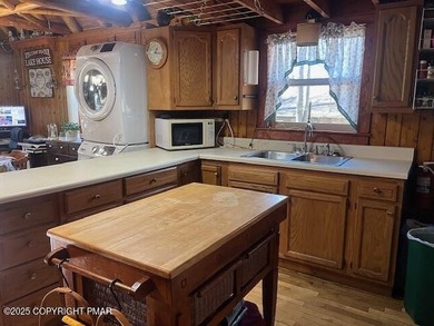 Classic Pocono Chalet in Lake Harmony Estates excellent location on Split Rock Resort and Country Club in Pennsylvania - for sale on GolfHomes.com, golf home, golf lot