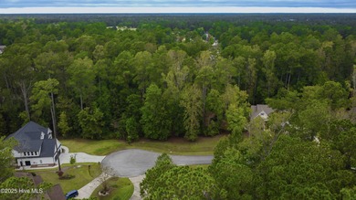 Build your dream home on this serene .61-acre lot in the on Carolina Colours Golf Club in North Carolina - for sale on GolfHomes.com, golf home, golf lot