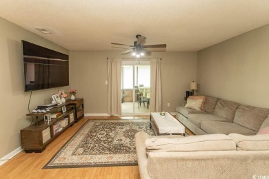 Step into the serene oasis of Myrtle Beach Golf & Yacht, a on Heron Point Golf Club in South Carolina - for sale on GolfHomes.com, golf home, golf lot