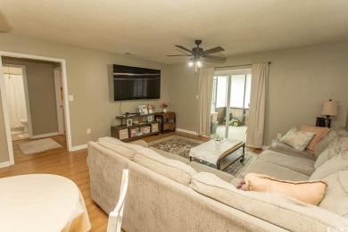 Step into the serene oasis of Myrtle Beach Golf & Yacht, a on Heron Point Golf Club in South Carolina - for sale on GolfHomes.com, golf home, golf lot